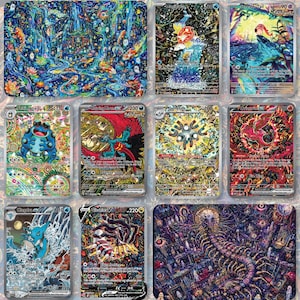 May include: A collection of vibrantly illustrated trading cards featuring various creatures and fantastical landscapes. The cards showcase detailed artwork with a variety of colors, including blues, greens, reds, and golds. The cards appear to be from a collectible card game.