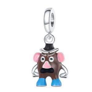 May include: A silver-toned metal charm featuring a brown potato-shaped character with a black hat, pink ears, a pink nose, a black mustache, and blue shoes. The charm includes a circular bail at the top for attachment to a bracelet or necklace chain.