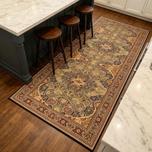 May include: A patterned rectangular rug with a central medallion design in green, gold, and burgundy. The rug has a detailed border and is placed on a wooden floor in a kitchen. The rug's dimensions are not visible.