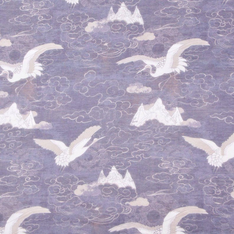 May include: A repeating pattern featuring white cranes in flight, mountains, and clouds on a muted purple background. The design has a soft, textured appearance, reminiscent of a watercolor painting. The overall theme is inspired by traditional Asian art.