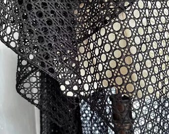 Zwarte stof met geometrische stippen, wateroplosbaar gaas (op maat verkocht)