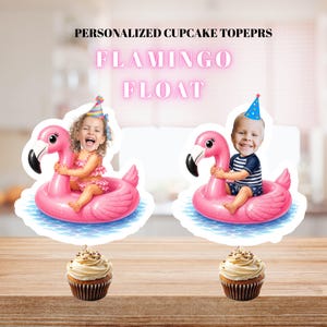 May include: Two personalised cupcake toppers featuring a pink flamingo float graphic with a child's face and a party hat. The text reads PERSONALIZED CUPCAKE TOPEPRS FLAMINGO FLOAT. Each topper is attached to a cupcake with white frosting in a brown liner.