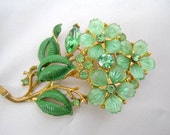 Flowered Brooch Green Rhinestone Molded Lucite Pin
