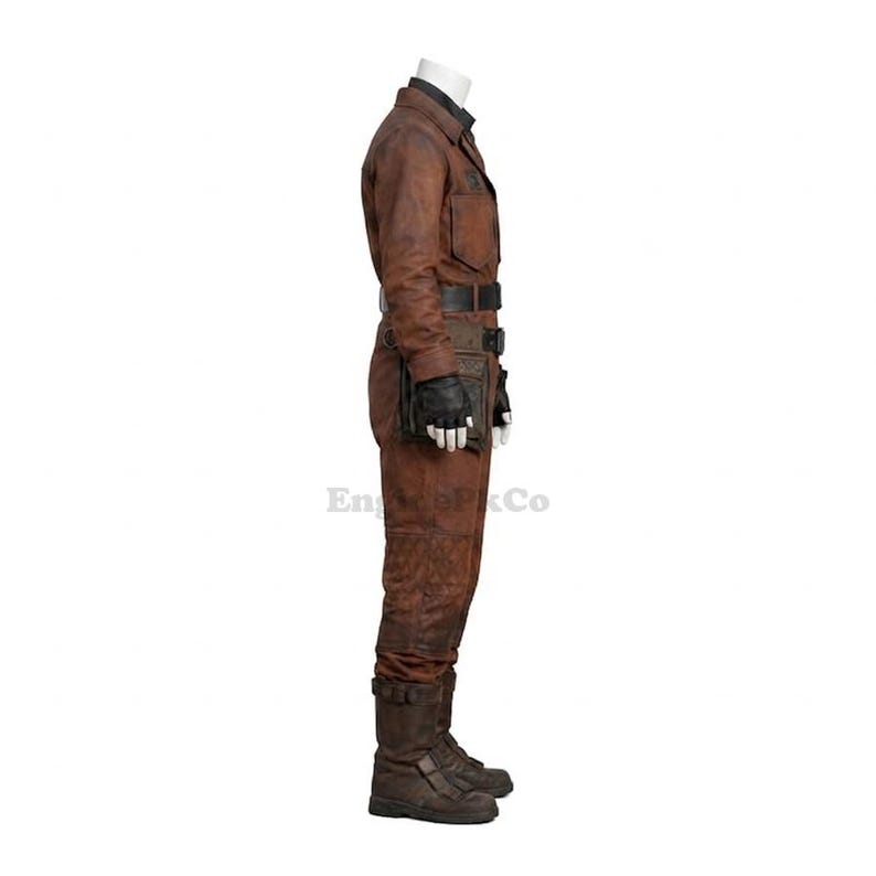 May include: A brown leather jumpsuit with a black collar, belt, and gloves. The jumpsuit has multiple pockets and a distressed appearance. The boots are brown and have buckles. The outfit is designed for cosplay or costume use.