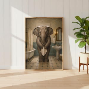 May include: A framed wall art print depicting a grey elephant standing in a bathroom. The elephant holds a white towel in its trunk. The bathroom features a white bathtub with a curtain, a pedestal sink, and a tiled floor with a diamond pattern.