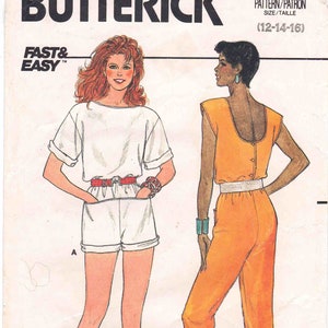 May include: A vintage sewing pattern from Butterick, pattern number 3183, for sizes 12-14-16. The pattern includes instructions for making two garments: a white top with rolled up sleeves and white shorts, and a sleeveless orange jumpsuit.