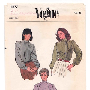 May include: A vintage sewing pattern for a blouse with a high collar and long sleeves. The pattern is for size 10 and is called "Drape Striped Blouse". The pattern is from Vogue and costs $4.50.