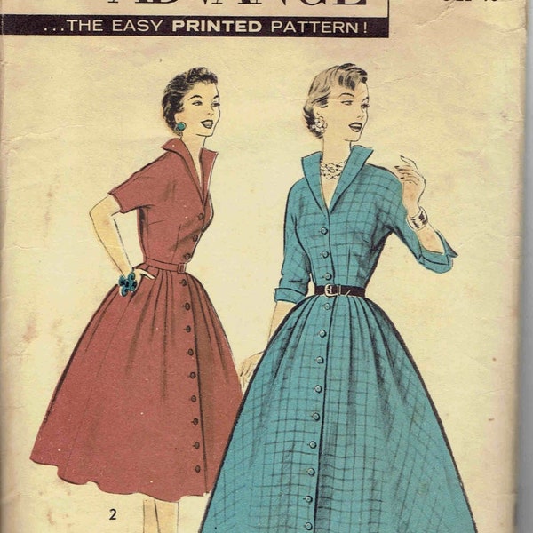 1950s Easy Shirtwaist Dress with Standing Wing Collar, Full Skirt,  and Pockets. Advance 8239 Pattern. Size 10 Bust 31 in. Waist 24 in.