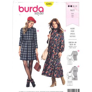 May include: Burda Style dressmaking pattern showing two dress designs, one plaid and one floral. The pattern includes sizes EUR 34-44 and US 8-18. The pattern is labelled as "easy".