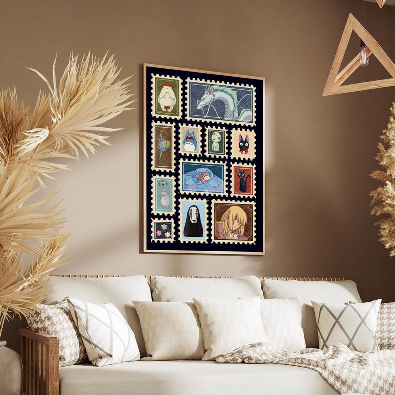 May include: A framed art print featuring a collection of colorful postage stamp designs. The stamps depict various characters and scenes, including a dragon, a girl in a blue dress, and a black cat. The artwork is set against a dark blue background.