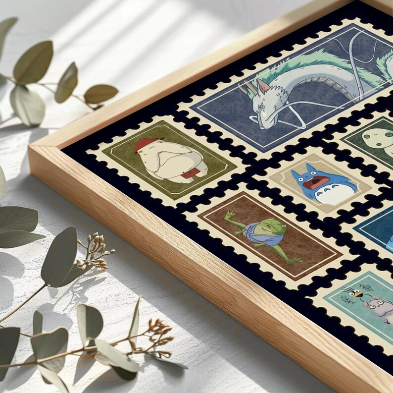 May include: A framed print featuring a collection of colorful postage stamp designs. The stamps showcase various cartoon characters, including a white dragon, a blue Totoro, and a green frog. The frame is made of light-colored wood.
