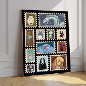 May include: A framed art print featuring a collection of anime-style postage stamps. The stamps showcase various characters in a variety of colors, including a white dragon, a blue Totoro, and a black cat. The frame is gold.