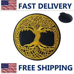 May include: A round, black patch with a gold-colored tree of life design. The patch has an embroidered border and a hook-and-loop fastener backing. The words "FAST DELIVERY" and "FREE SHIPPING" are displayed.