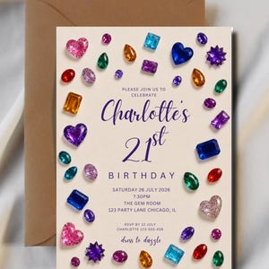 May include: A cream-colored birthday invitation card featuring a border of colorful, multi-shaped gemstone illustrations. The text reads: PLEASE JOIN US TO CELEBRATE Charlotte's 21st BIRTHDAY SATURDAY 26 JULY 2026 7:30PM THE GEM ROOM 123 PARTY LANE CHICAGO, IL RSVP BY 12 JULY CHARLOTTE 123-555-456 dress to dazzle.