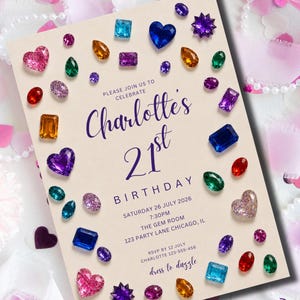 May include: A cream-colored birthday invitation card featuring a border of colorful, multi-shaped gemstone illustrations. The text reads: Please join us to celebrate Charlotte's 21st birthday, Saturday 26 July 2026, 7:30pm, The Gem Room, 123 Party Lane Chicago, IL, RSVP by 12 July Charlotte 123-555-456, dress to dazzle.