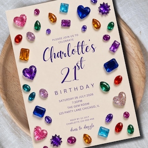 May include: A rectangular birthday invitation card on a cream background featuring scattered colorful gemstone illustrations in various shapes like hearts, ovals, and squares. The text reads: Please join us to celebrate Charlotte's 21st Birthday.