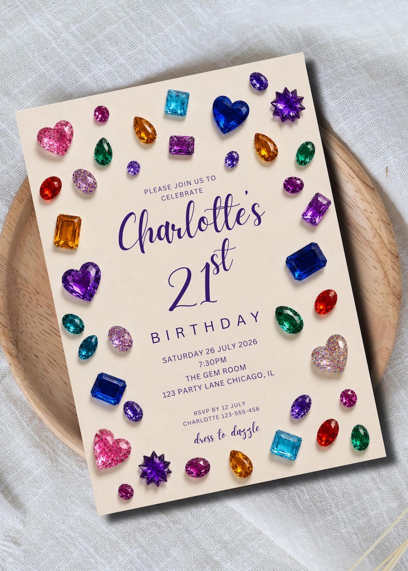 May include: A rectangular birthday invitation card on a cream background featuring scattered colorful gemstone illustrations in various shapes like hearts, ovals, and squares. The text reads: Please join us to celebrate Charlotte's 21st Birthday.