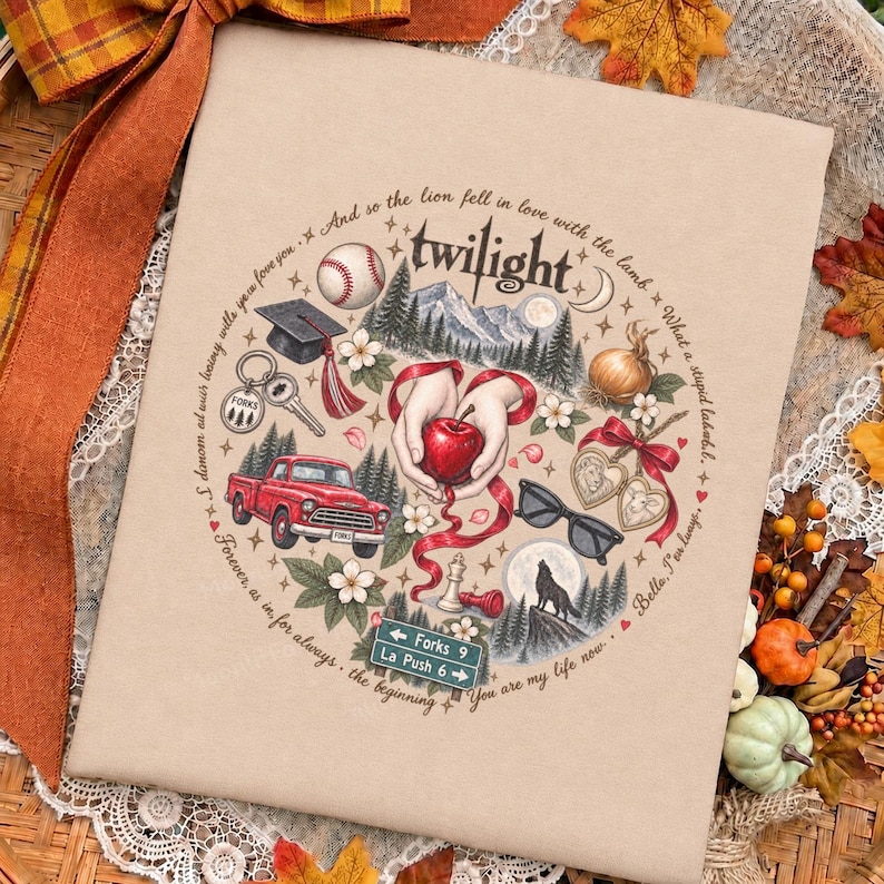 May include: A tan fabric surface featuring a circular illustration with the text Twilight. The design includes a baseball, graduation cap, red truck, apple held by hands, sunglasses, wolf, and a road sign reading Forks 9 and La Push 6.