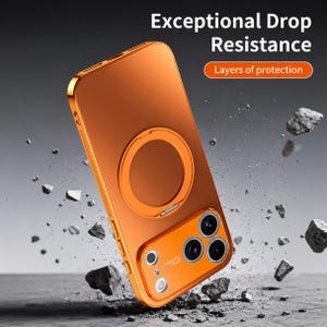 May include: Orange phone case with a gold-colored frame and a circular ring holder. The case has a camera cutout and the text "Exceptional Drop Resistance" and "Layers of protection". The phone case is shown with rocks around it.