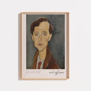 May include: A framed art print featuring Amedeo Modigliani's Portrait of Franz Hellens. The painting depicts a person with brown hair, a brown coat, and a white shirt with a red tie against a dark gray background. Text at the bottom reads Modigliani.