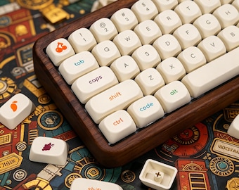 May include: A mechanical keyboard with a dark brown wooden frame and off-white keycaps. The keys feature dark lettering and colorful icons, including a cherry, a mango, and grapes. Some keys are labeled with text like tab, caps, shift, and code.