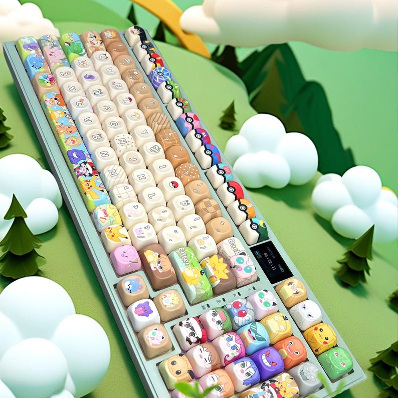 May include: A mint green mechanical keyboard with custom keycaps featuring colorful cartoon character designs. The keycaps have various colors and designs, including characters and patterns. The keyboard has a small display screen and is set against a green and white background.