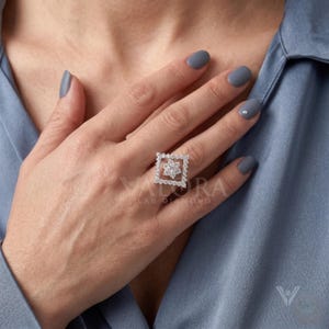 Beautiful lifestyle image featuring a dainty cluster shape style ideal for a meaningful promise ring. This handmade platinum jewelry serves as an elite anniversary gift she will treasure for long years. Select this birthday present as an affordable luxury statement piece filled with maximum fire spark. This custom look stands out beautifully during upcoming seasonal holiday gifting quarters.