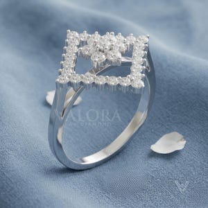 Side profile view highlighting a 2mm tapered band layout with elevated setting height architecture. Crafted in luxury 10k solid gold, this structural shank supports an open geometric square halo frame. Offers custom antique appeal for bridal collection sets looking to capture an affordable royal vibe. Polished fine edges deliver a timeless unique engagement band look that shines bright for customers.
