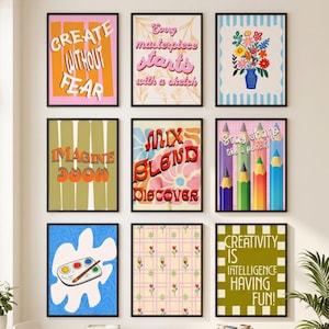May include: A gallery wall featuring nine framed art prints with various designs including text like CREATE WITHOUT FEAR, Every masterpiece starts with a sketch, IMAGINE MORE, MIX BLEND DISCOVER, Stay sharp like a pencil, and CREATIVITY IS INTELLIGENCE HAVING FUN.