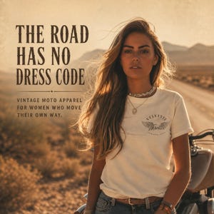 May include: A cream-colored short-sleeve t-shirt featuring a small graphic on the chest with the text Velvette Throttle and a winged emblem. The image includes the text THE ROAD HAS NO DRESS CODE and VINTAGE MOTO APPAREL FOR WOMEN WHO MOVE THEIR OWN WAY.