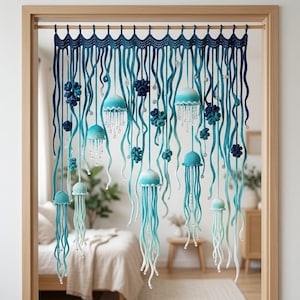 May include: A handmade crochet jellyfish curtain in shades of blue and turquoise. The curtain features multiple jellyfish with dangling tentacles and decorative accents, creating a whimsical, ocean-themed decor piece. The curtain is suspended from a wooden frame.