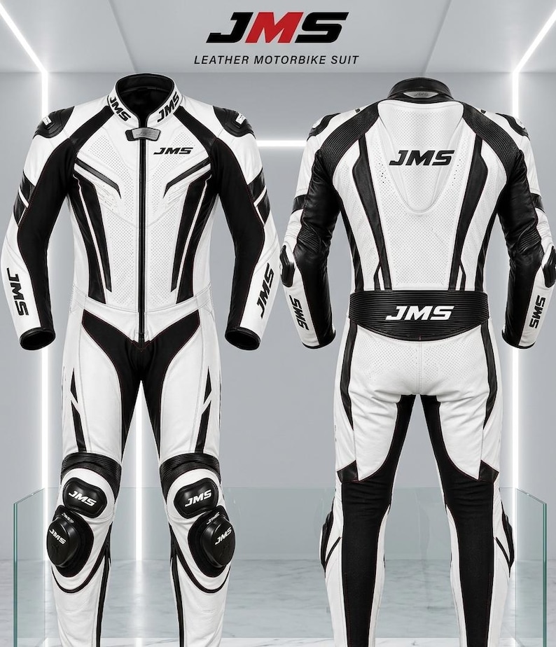 May include: A white and black leather motorbike suit with the text "JMS" on the chest, shoulders, and legs. The suit features black accents and protective padding on the knees and shoulders. The words "LEATHER MOTORBIKE SUIT" are at the top.