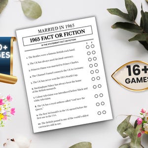 May include: A black and white game sheet titled "Married in 1965 Fact or Fiction" with 10 statements. The image includes a scroll with "350+ PAGES" and a gold-framed sign that says "16+ GAMES". Decorative flowers and greenery surround the game.