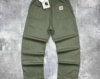 Pantalones Carhartt WIP Crawford color verde dólar, mezcla de cáñamo y algodón, tallas S y XS, nuevos con etiquetas, corte relajado, ropa de trabajo, pantalones cargo vintage, vaqueros, alfombra