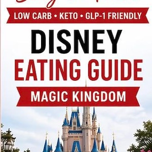 May include: A guide titled "Disney Eating Guide Magic Kingdom" with the text "Stay on Track" and "Low Carb, Keto, GLP-1 Friendly." The image features Cinderella's castle, with a red and white color scheme.