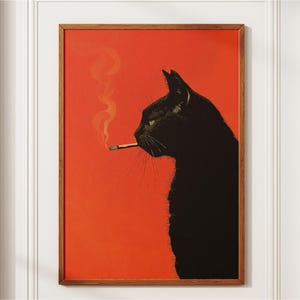 Può includere: Una stampa artistica da parete incorniciata che mostra il profilo di un gatto nero su uno sfondo arancione vivace. Il gatto è raffigurato con una sigaretta accesa in bocca, da cui si alza un sottile filo di fumo verso lo spazio arancione.
