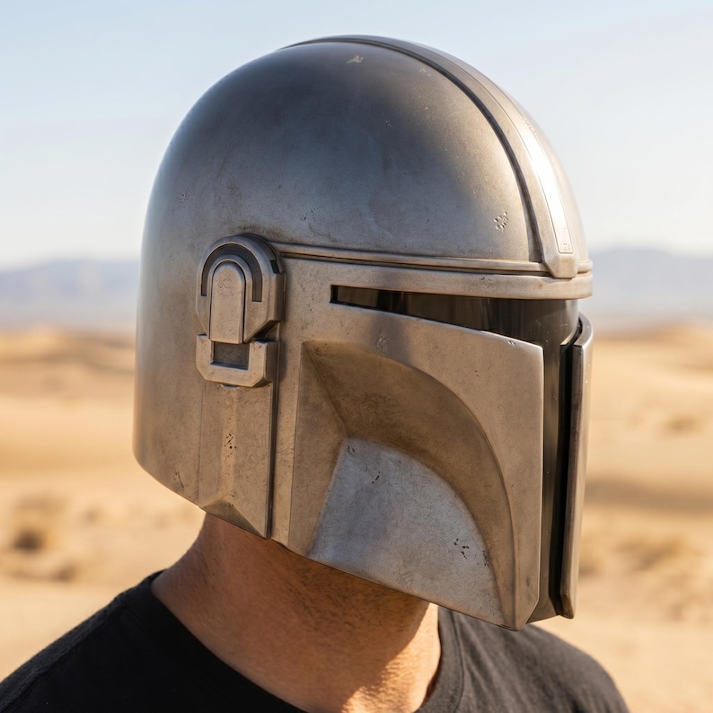 mandalorian helmet, beskar helmet replica, star wars helmet, mandalorian cosplay, bounty hunter helmet, wearable steel helmet, handmade helmet, metal cosplay helmet, mandalorian armor, sci fi helmet, cosplay prop helmet, comic con costume, larp helmet, collector helmet, screen inspired helmet, custom armor helmet, galactic warrior helmet, premium cosplay gear, fan collector gift, battle worn helmet,