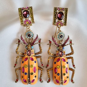 Pendientes de escarabajo de Heidi Daus, multicolor naranja, largos y colgantes, raros, originales, extraordinarios.