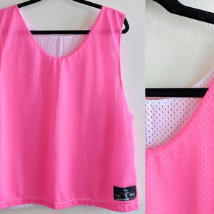 Neon Pink Cropped Jersey with &quot;ROXY&quot; Printed on Back Reversible to White Side