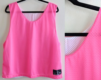 Neon Pink Cropped Jersey with "ROXY" Printed on Back Reversible to White Side