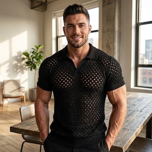 May include: A black polo shirt with a unique open-knit design. The short-sleeved shirt features a collared neckline and a textured appearance. The shirt is made of a breathable material, perfect for warm weather.