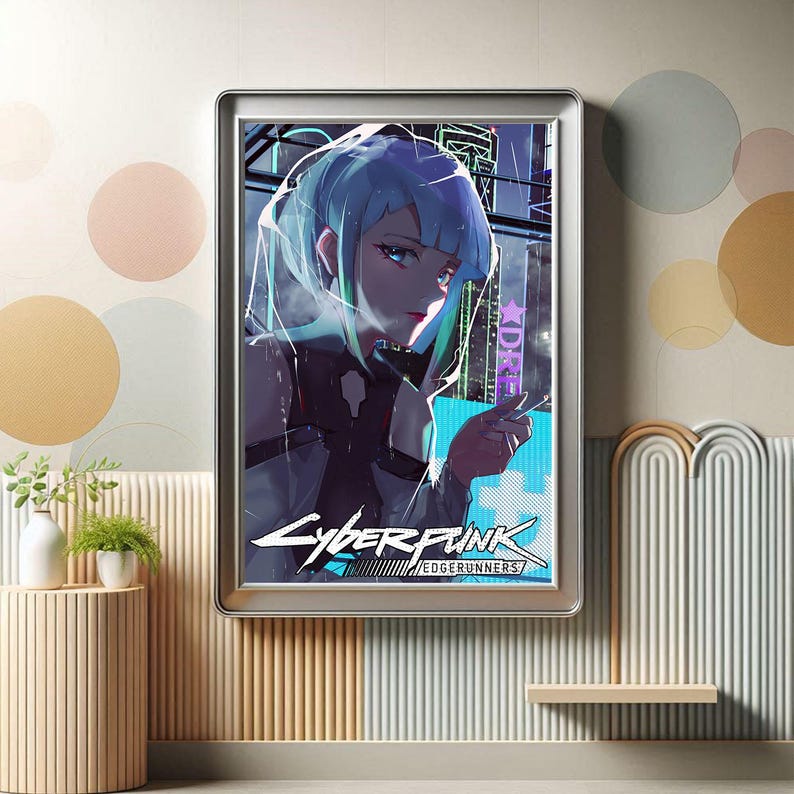 May include: Framed artwork featuring a stylized anime character with blue hair, set against a futuristic cityscape. The artwork has the text "Cyberpunk Edgerunners" in a stylized font, with a silver frame.