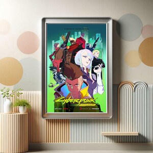 May include: A framed poster for the Netflix anime series "Cyberpunk: Edgerunners." The poster features a vibrant illustration of several characters in a futuristic cityscape. The poster has a silver frame and is displayed on a wall with decorative elements.