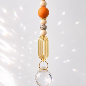 Acchiappasole con cristallo di vetro | Decorazione boho per finestre | Cattura la luce | Crea arcobaleni | Ciondolo in cristallo dorato fatto a mano | Regalo per la fidanzata
