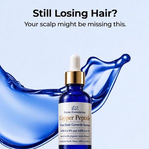 May include: A blue glass dropper bottle of Precise Formulations Copper Peptide True Hair Growth Serum with a gold cap and white label. The text reads Still Losing Hair? Your scalp might be missing this. GHK-Cu 6% and AHK-Cu 1%.