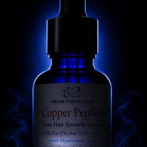 May include: A dark blue glass dropper bottle of Precise Formulations Copper Peptide True Hair Growth Serum. The label lists GHK-Cu 6%, AHK-Cu 1%, and Hyaluronic Acid. The bottle contains 30ml or 1 fl. oz and is surrounded by a blue glow.