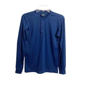 May include: A solid navy blue long-sleeve henley shirt featuring a round neckline with a partial button-down placket containing four visible buttons. The garment has long sleeves with fitted cuffs and is displayed on a clear plastic hanger.