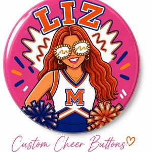 May include: A circular button featuring a cartoon illustration of a cheerleader with long wavy auburn hair, wearing white and blue uniform with an orange M, holding blue and orange pom-poms, wearing sunglasses, with the name LIZ in orange.