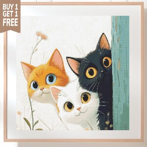 May include: A framed square print featuring three cats peeking from behind a textured blue wooden post. An orange cat with blue eyes, a white cat with yellow eyes, and a black cat with yellow eyes are depicted against a light background.