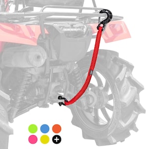 May include: A red ATV recovery strap with black hooks attached to a red ATV. The strap is made of a braided material. The ATV has a black tyre and a black hook.